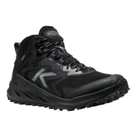 A black Keen mid-cut hiking boot with gray reflective accents and a rugged sole, shown from a three-quarters angle on a white background.