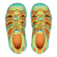 Pair of colorful sandals with orange, green, and blue design on a white background
