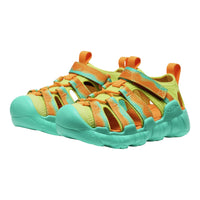 Pair of colorful sandals with orange and green straps on a white background