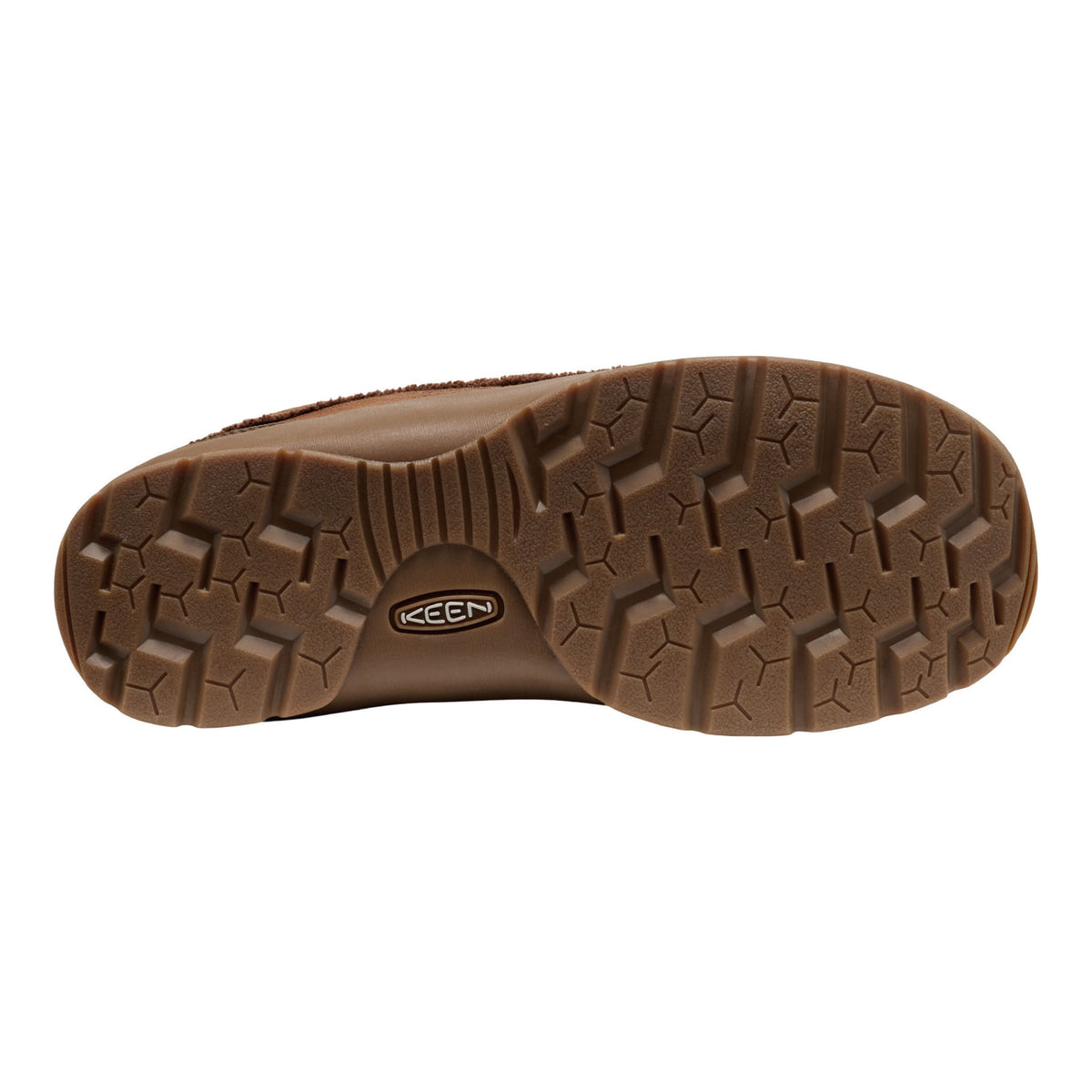 A close-up, top-down view of a brown textured shoe sole, showing the tread pattern and a visible Keen logo in the center, set against a plain white background.