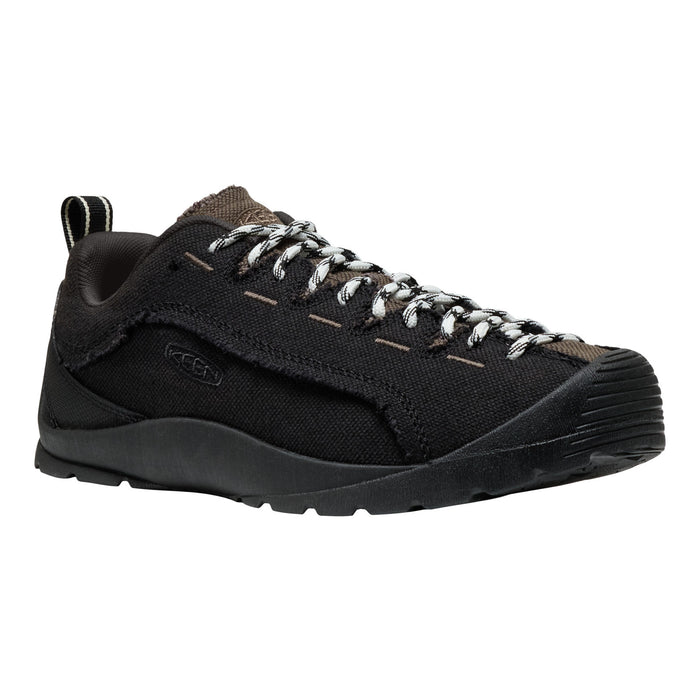A black Keen hiking shoe with brown suede overlays, black laces, and a black sole, shown from a side profile on a white background.