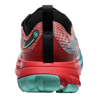 Back view of a colorful running shoe with red, black, and teal design on a white background