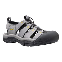 Gray sandal with black sole on a white background