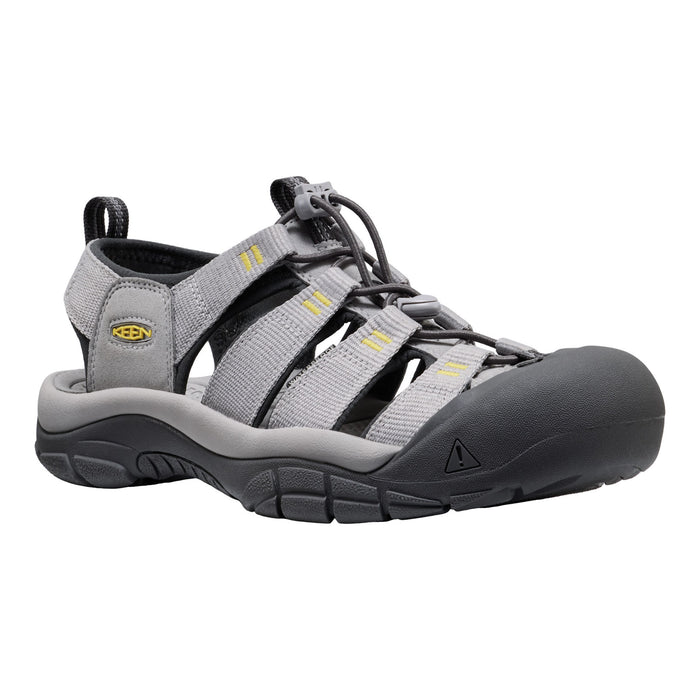 Gray sandal with black sole on a white background