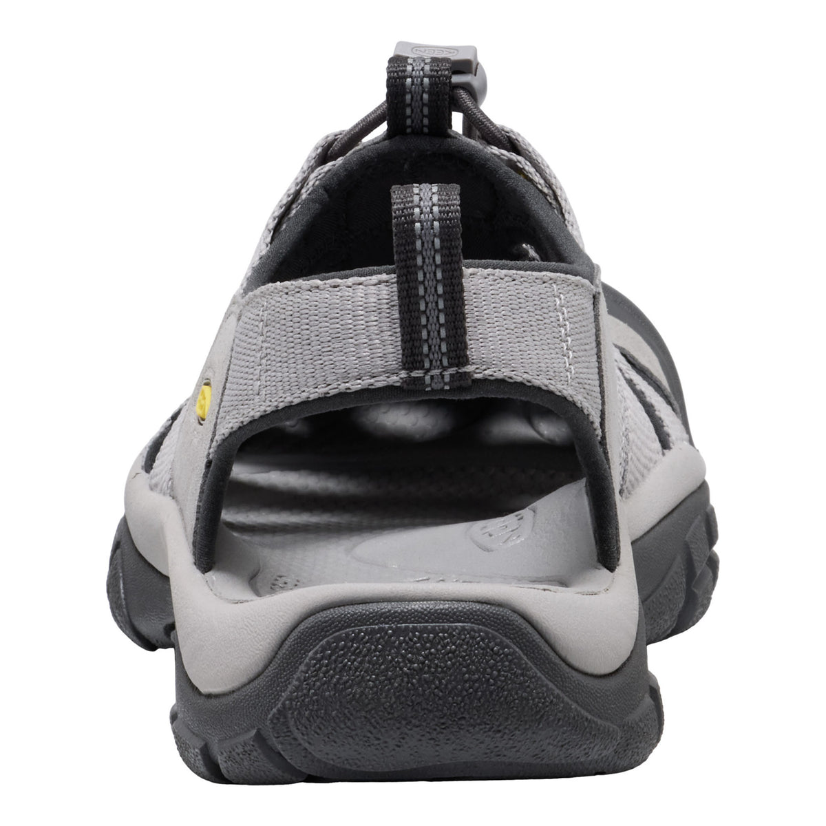 Gray sandal with black sole on a white background