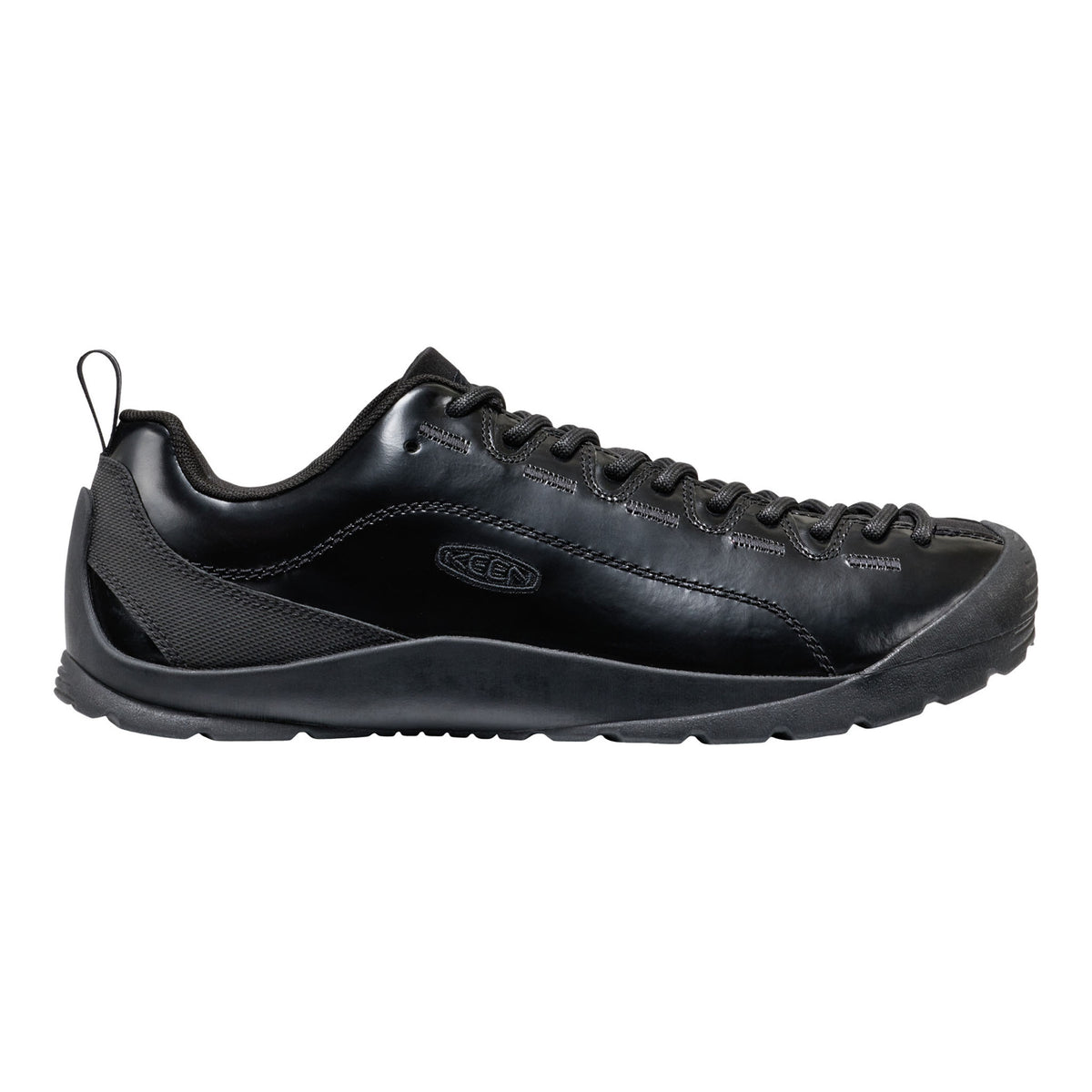 Black sports shoe with a brown sole on a white background