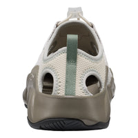 Sole of a shoe with a strap on a white background