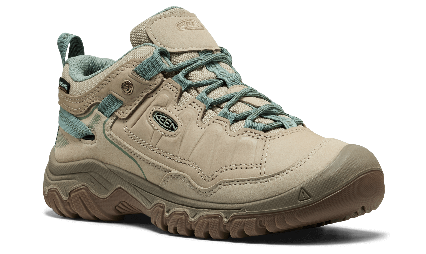 Beige hiking shoe with teal laces on a black background