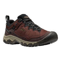 A Keen hiking boot in dark brown and black with a beige midsole, shown from a side profile on a white background.