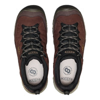 A pair of Keen hiking shoes shown from a top-down view on a plain white background. The shoes are primarily dark brown with black laces, black collar trim, and a white insole featuring the Keen logo.