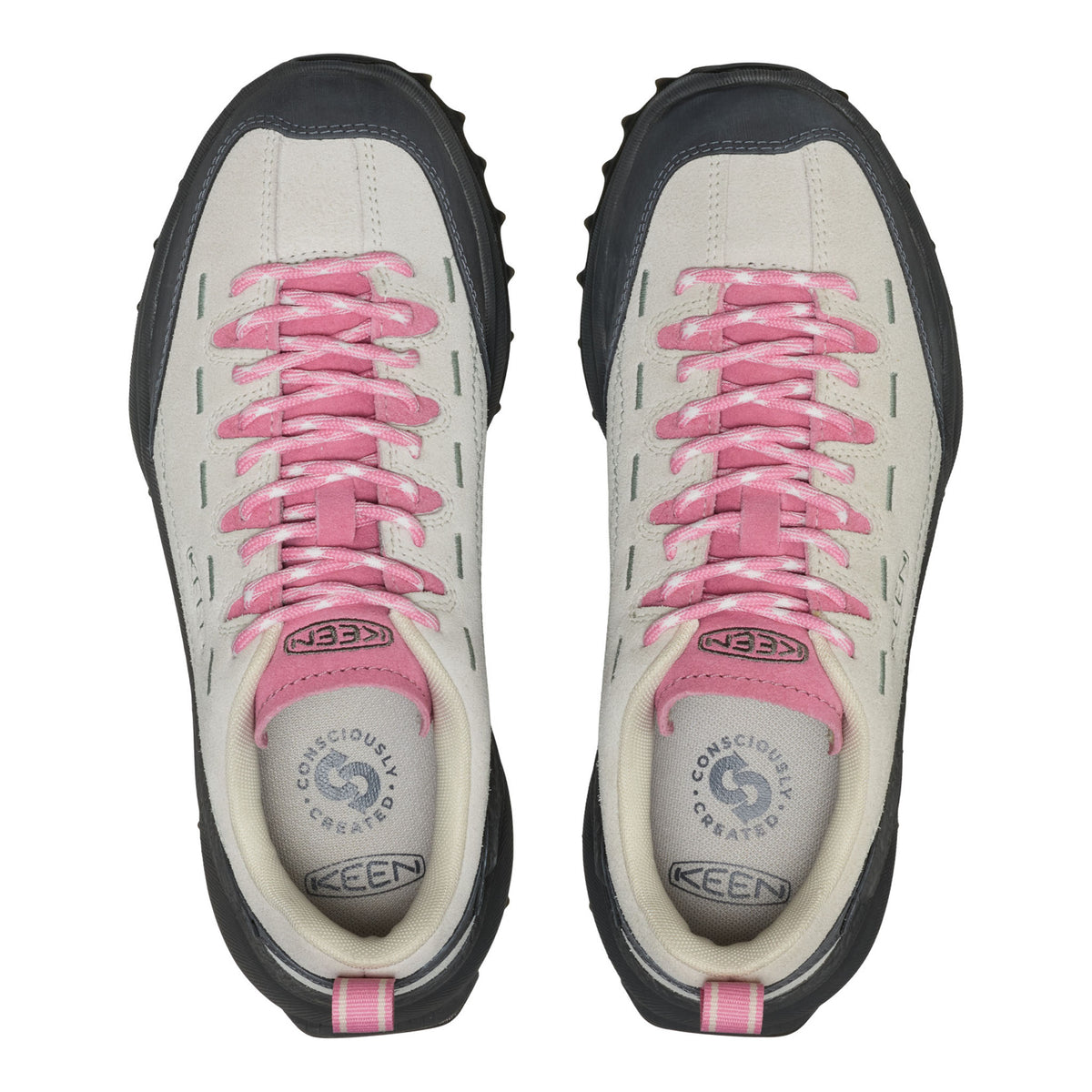 Pair of Keen shoes with pink laces on a white background