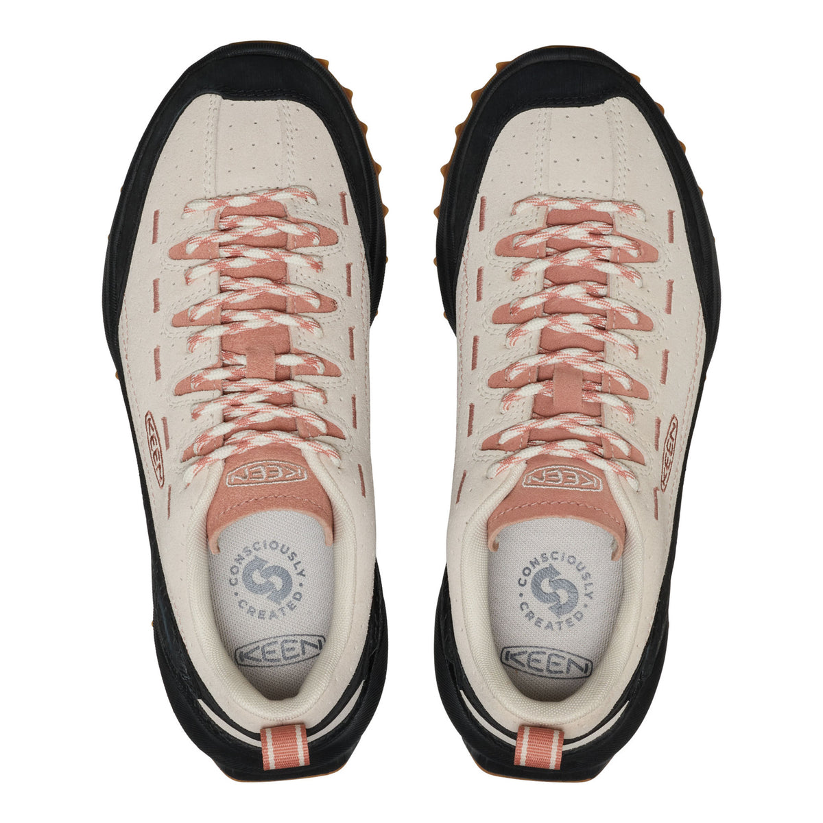 Pair of KEEN hiking shoes with pink laces on a white background