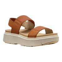Brown sandal with platform sole on a white background