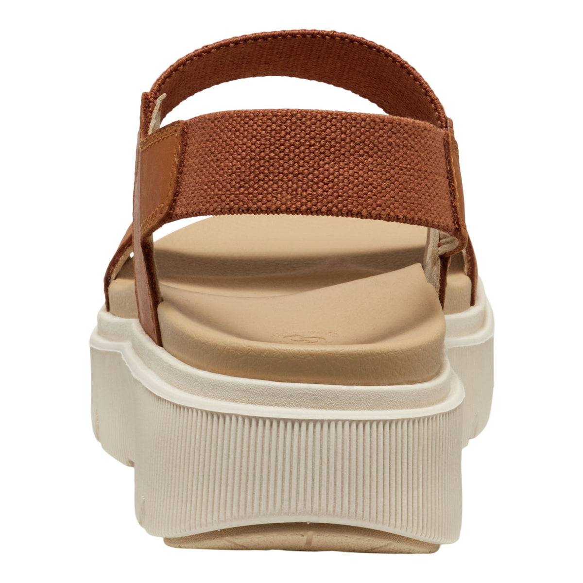 Brown sandal with a beige sole on a white background