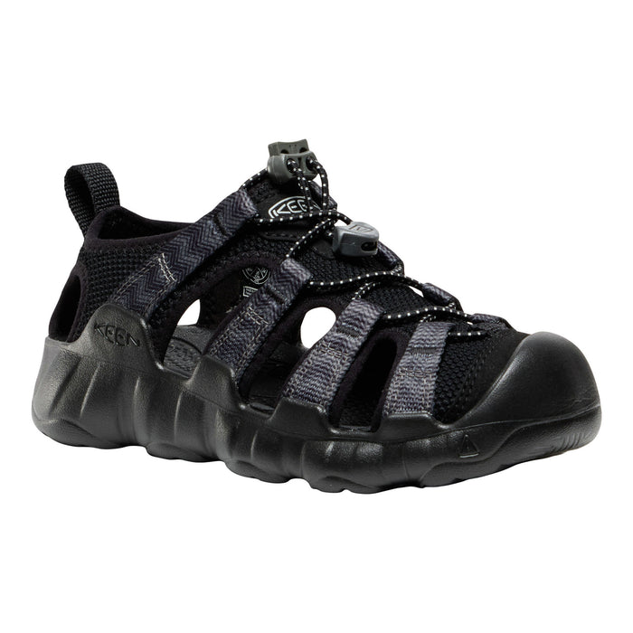 A black kids Keen sandal with textured straps and a thick, rugged sole, shown from a three-quarters angle on a white background.