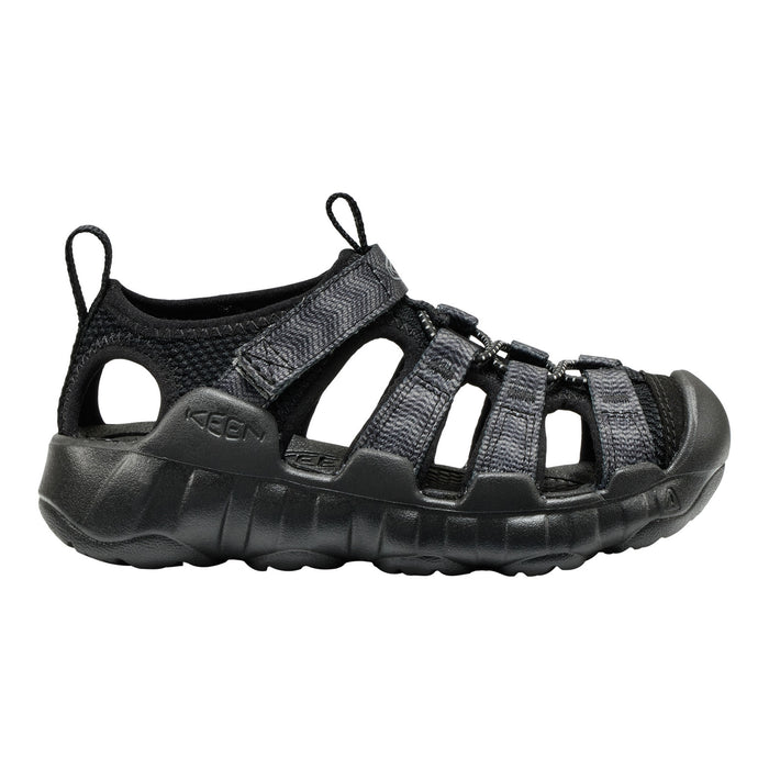 A black Keen sandal with multiple adjustable straps and a thick textured sole, shown in a side profile on a white background.