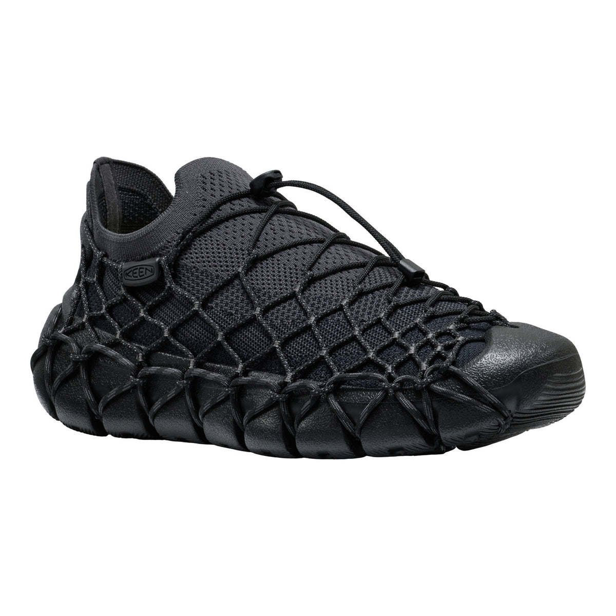 Black lace-up sneaker on a white background