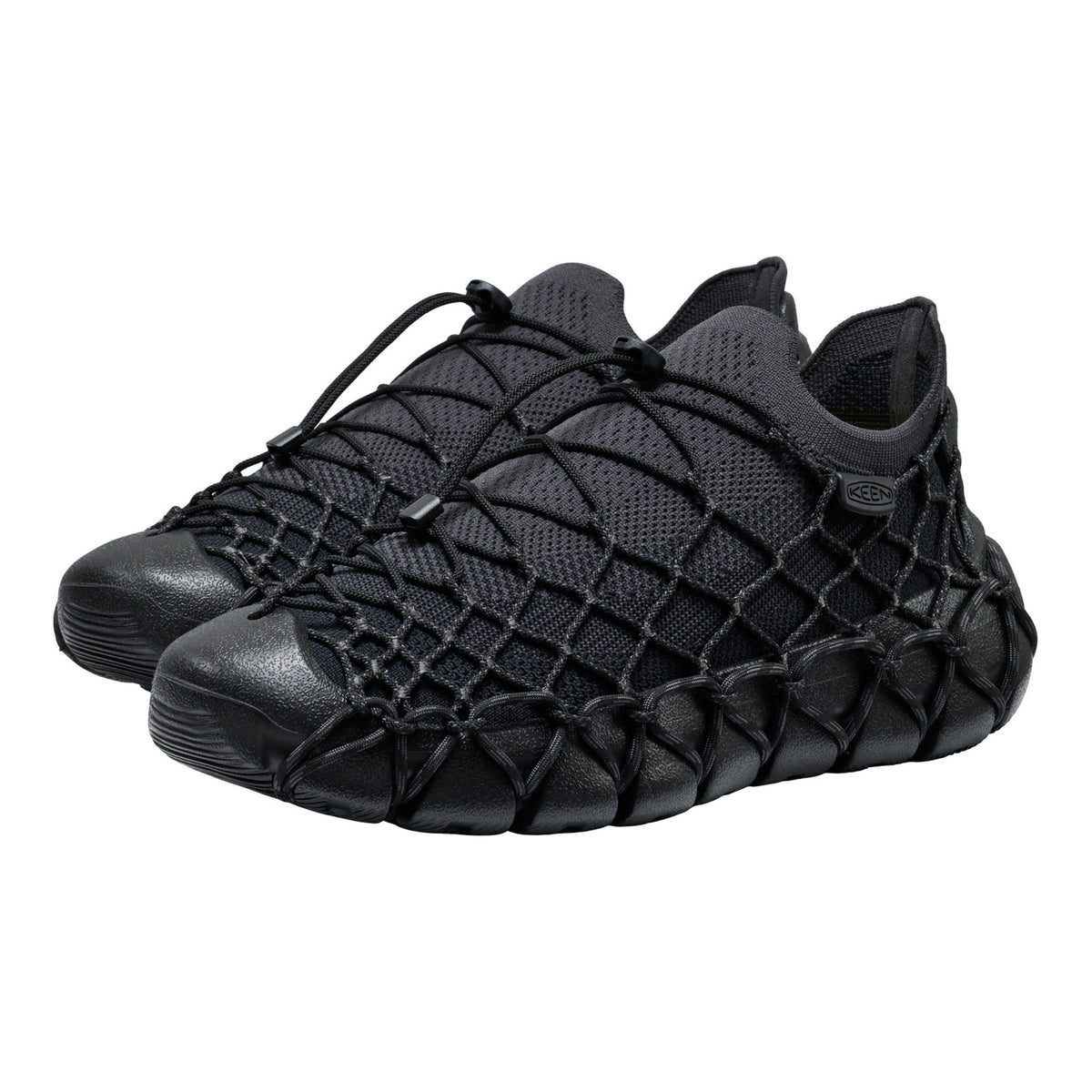 Black woven sneakers on a white background