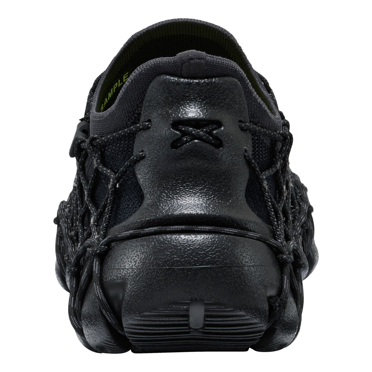 Black shoe with unique sole design on a white background