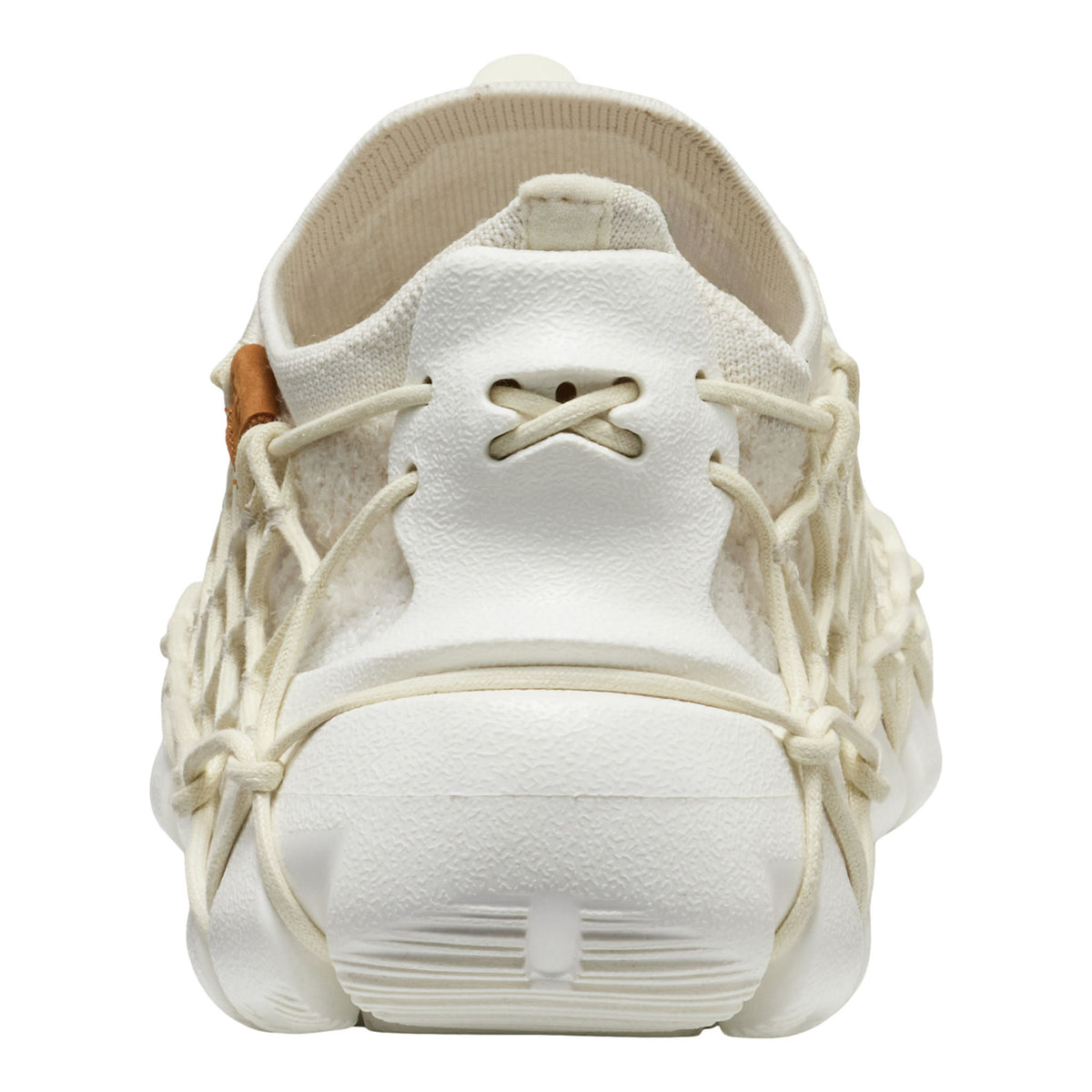 White sneaker with unique sole design on a white background