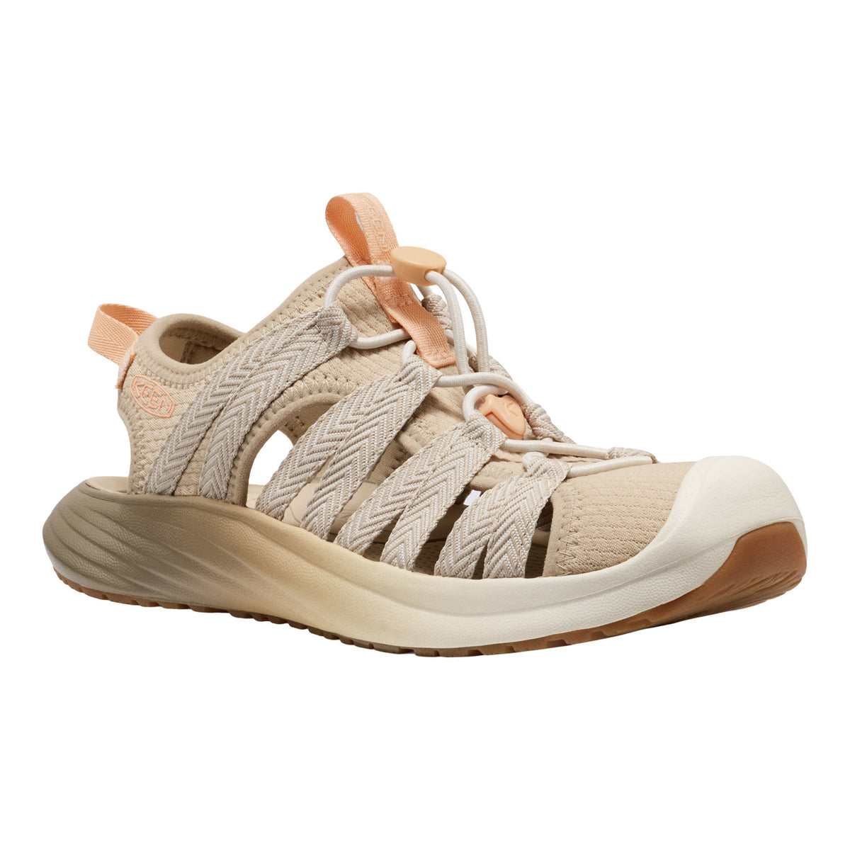Beige sandal with brown sole on a white background