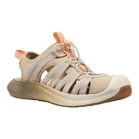 Beige sandal with brown sole on a white background