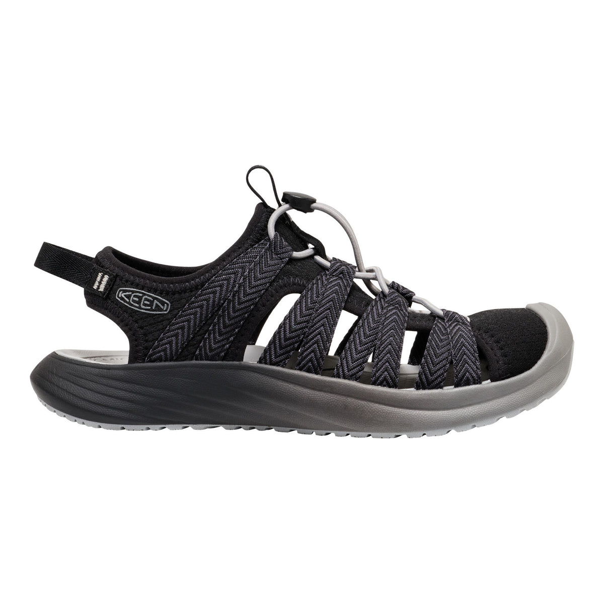 Black sandal with gray sole on a white background