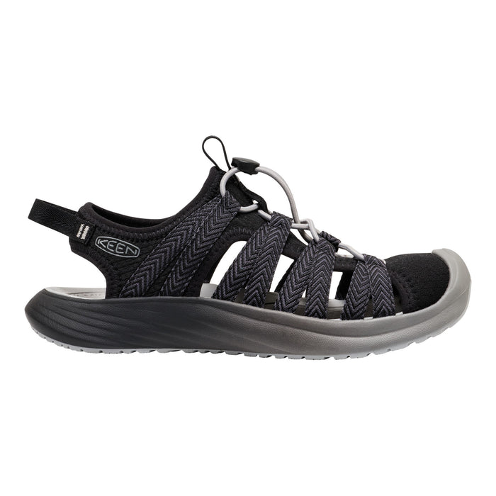 Black sandal with gray sole on a white background