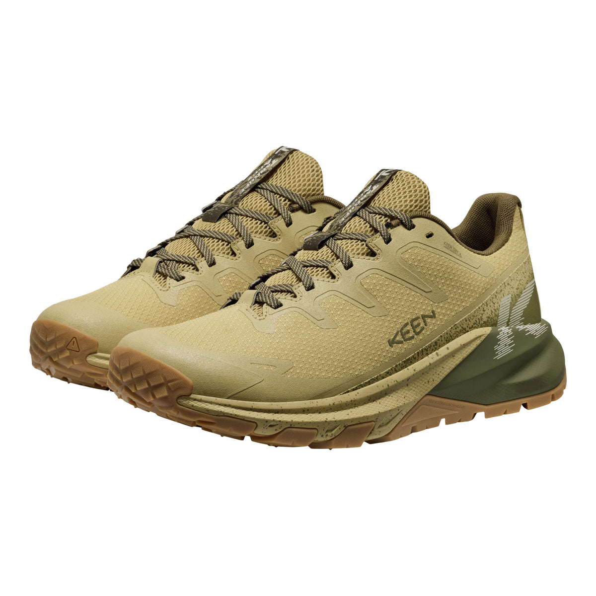 A pair of KEEN brand trail running shoes in a desert sand and olive green colorway, shown from a three-quarters angle on a plain white background.