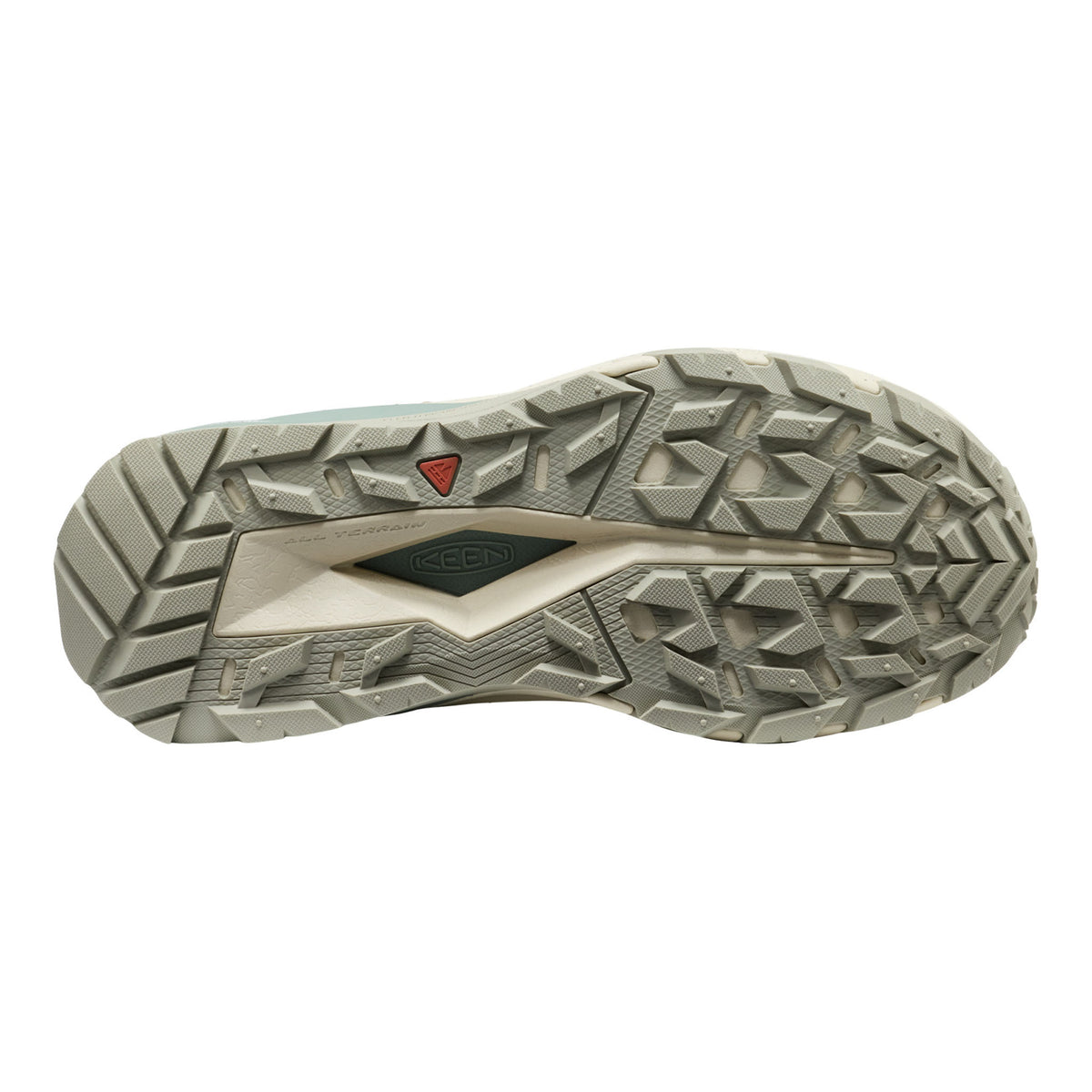 The outsole of a trail running shoe, showing a textured, multi-directional tread pattern in a light gray and beige colorway with a small red Keen logo.