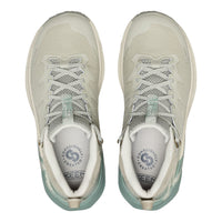 A pair of Skechers outdoor hiking shoes shown from a top-down view, featuring a light beige mesh upper with mint green accents on the heel and tongue, and matching laces.