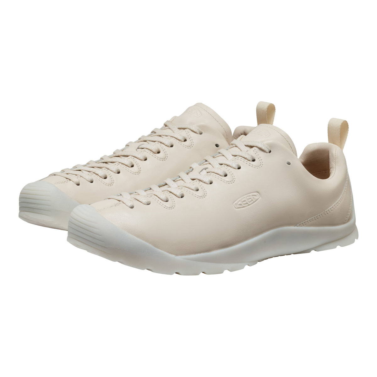 Beige sneakers on a white background