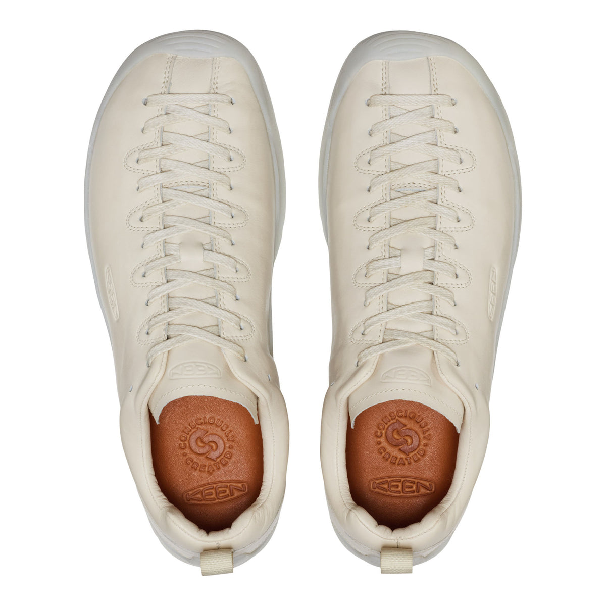 Pair of beige sneakers with brand logo on a white background