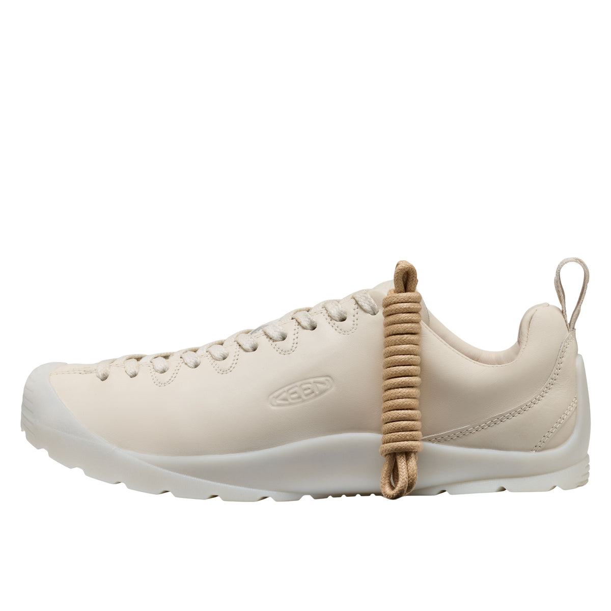 Beige sneaker with a white sole on a white background