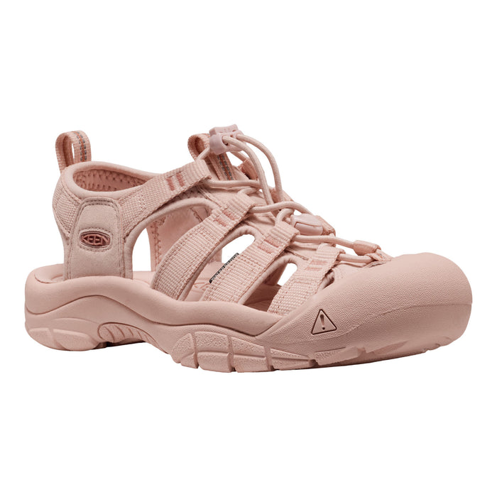 Pink sandal with lace-up design on a white background