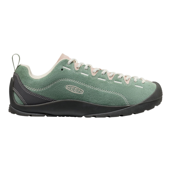 Green and black sneaker with KCCO logo on a white background