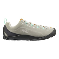Grey sneaker with black sole on a white background