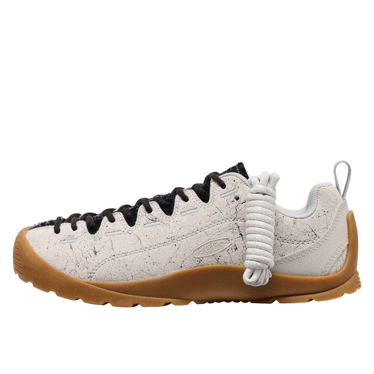 White sneaker with black accents on a white background