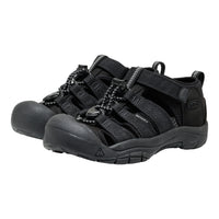 Black hiking shoes with multiple straps on a white background