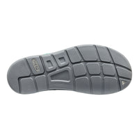 Gray shoe sole with brand logo on a white background