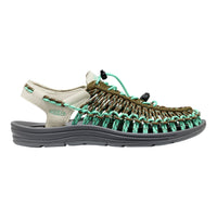 Sandal with braided design on a white background