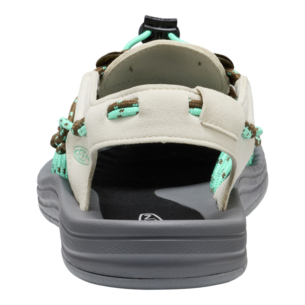 Back view of a sandal with beige straps and gray sole on a white background