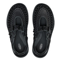 Pair of black sandals with woven design on a white background