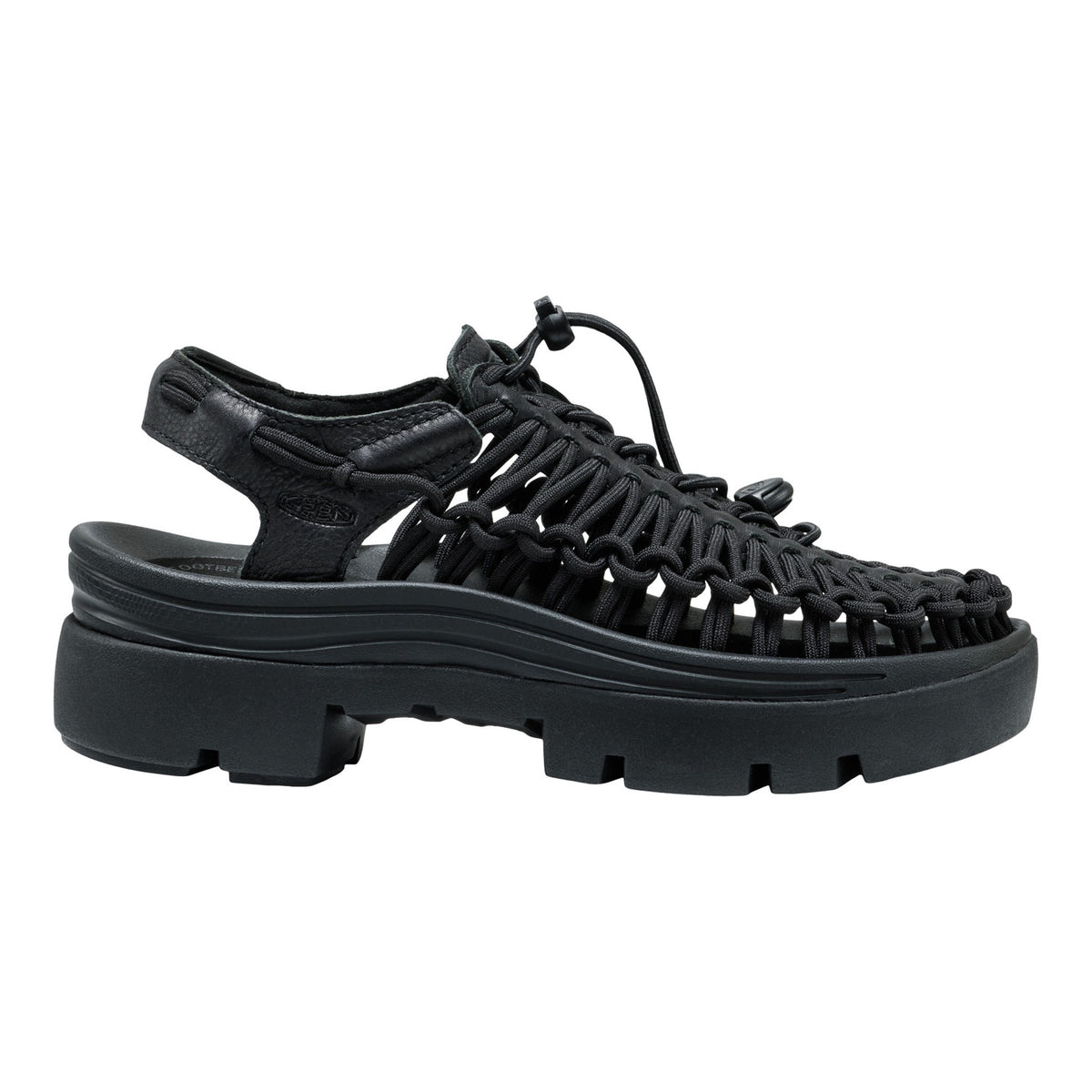 Black woven sandal with thick sole on a white background