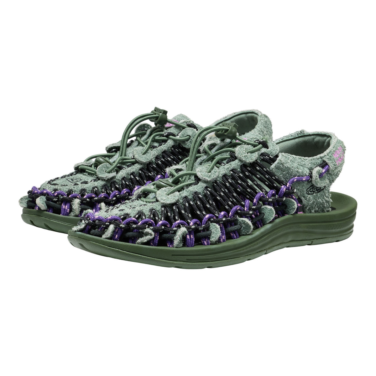 Pair of green and gray sandals with purple accents on a white background