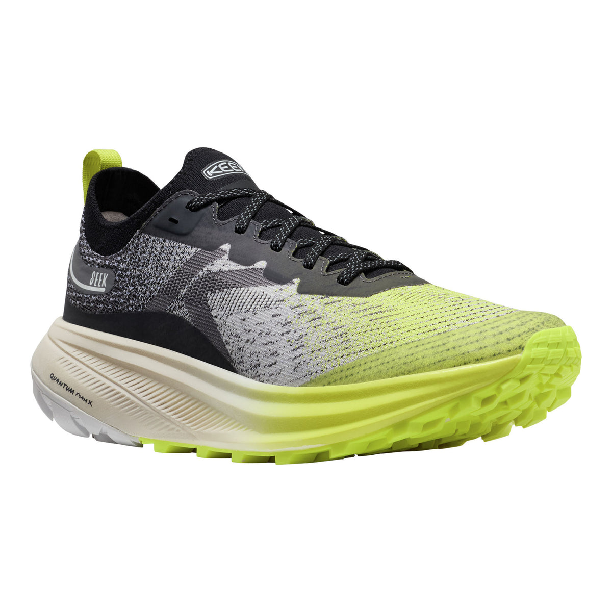 Gray and yellow running shoe on a white background