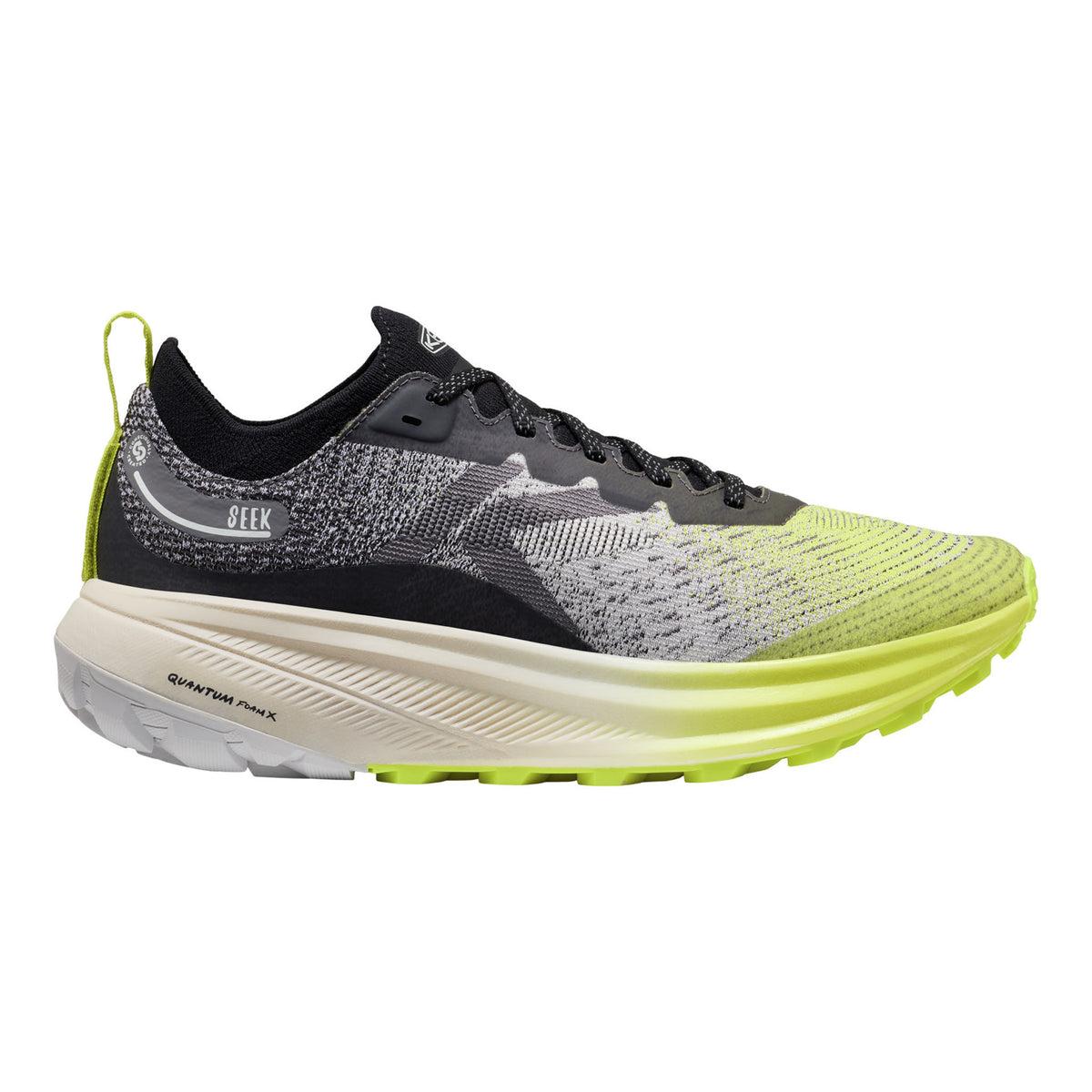 Gray and black running shoe with a yellow sole on a white background
