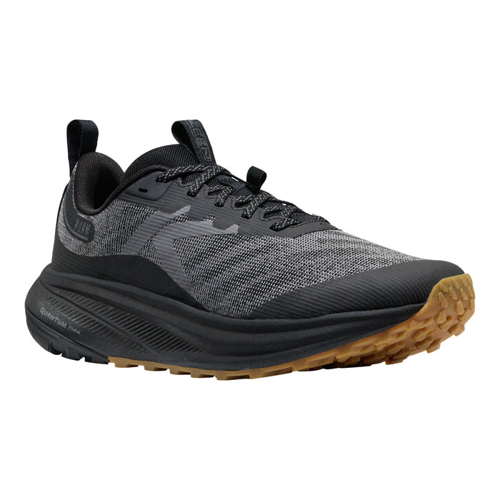 A single athletic trail running shoe shown in a side profile view against a solid white background. The shoe features a textured gray and black knit upper, black laces, a black midsole, and a rugged brown outsole.