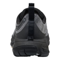 Close-up rear view of a black and gray athletic shoe showing the heel, pull tab, textured mesh upper, and rugged sole on a white background.
