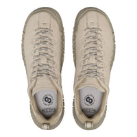 A pair of KEENs in a light beige/tan color, shown from a top-down view on a white background.